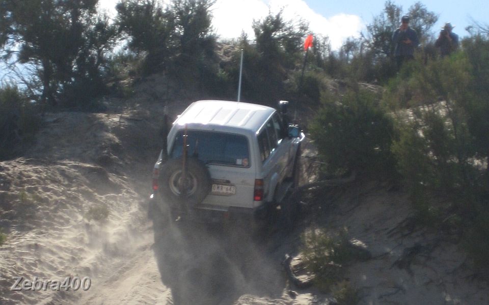23-Zebra winds up the diesel to climb the dune.JPG